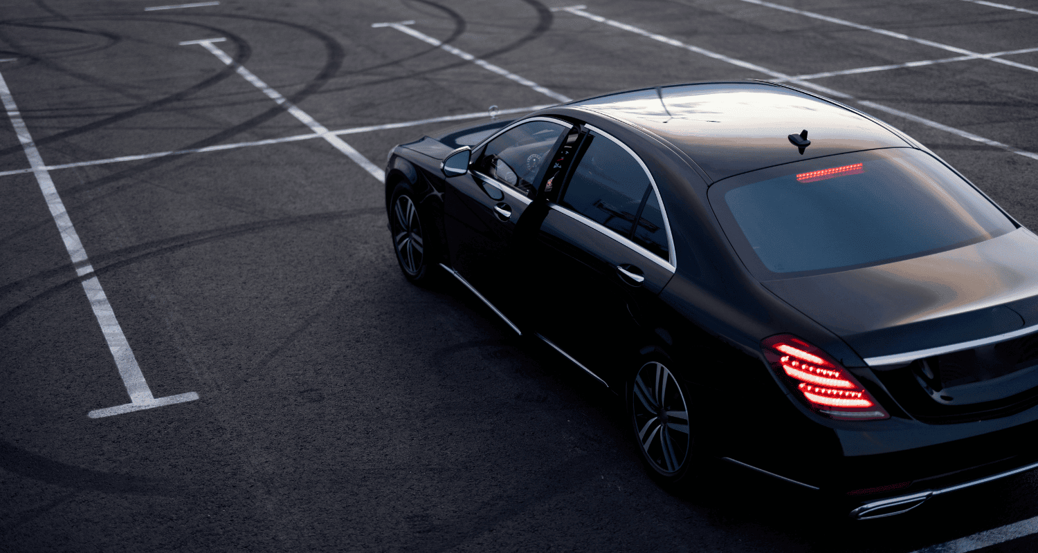 Luxurious black town car parked in Nassau County, providing premium town car service for business and leisure travel.