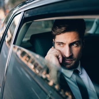 NYC Premiere Car Service featuring luxury sedans, SUVs, and executive vans against a stunning cityscape backdrop.